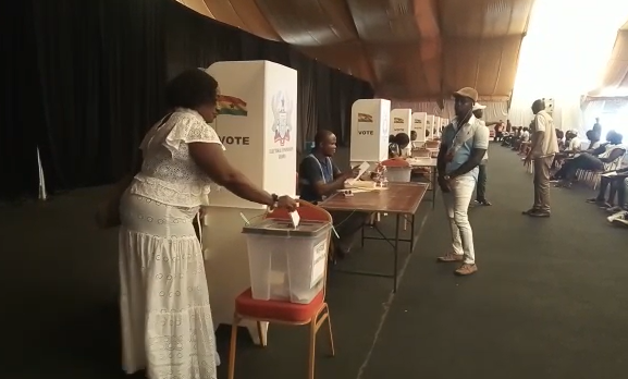 A delegate casts her vote at the Greater Accra NPP regional delegates conference